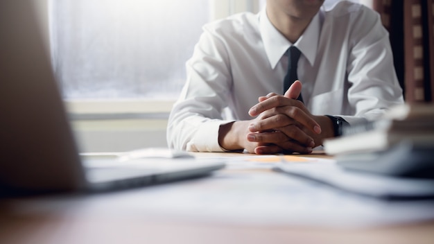 Businessman working at office with laptop. concept of modern business. vintage tone.