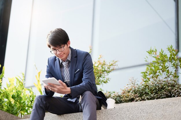 Businessman working outdoor.