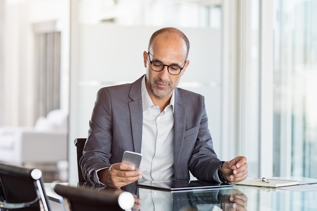 Businessman working on phone