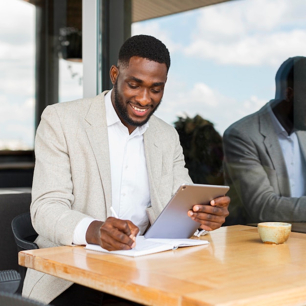 Businessman working on tablet