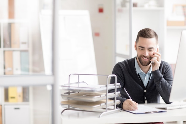 Businessman Working with Client