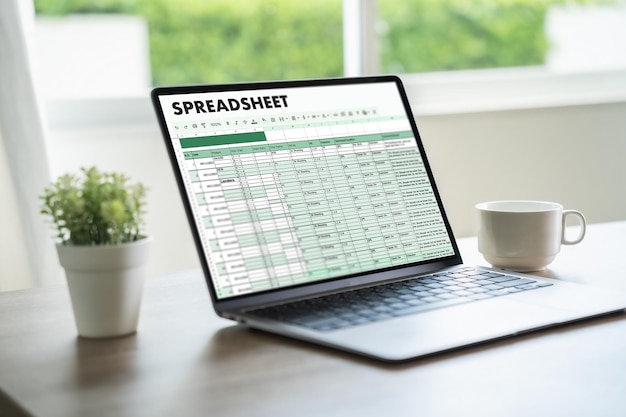 businessman working with data and graphs in spreadsheet documents for online analysis Microsoft Excel project dashboard accounting digital