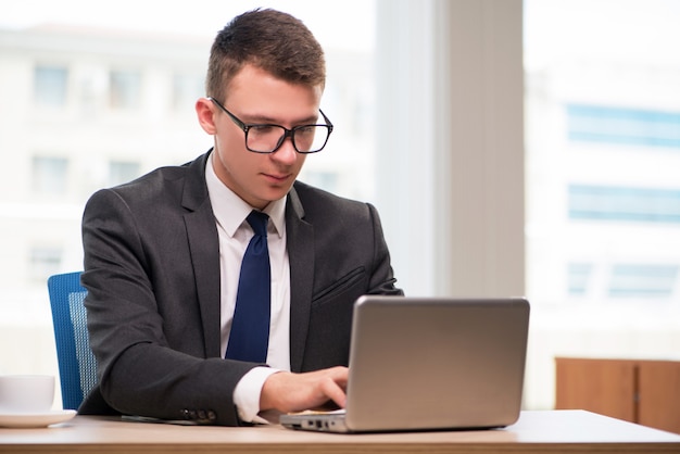 Businessman working with much paperwork