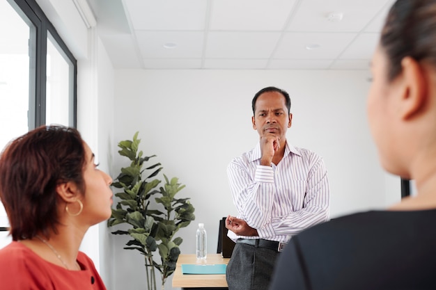 Businessman working with partners at office