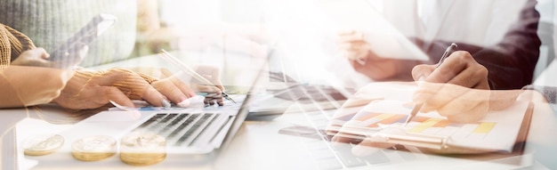 Businessman working with smart phone and laptop and digital tablet computer in office with digital marketing media in virtual icon