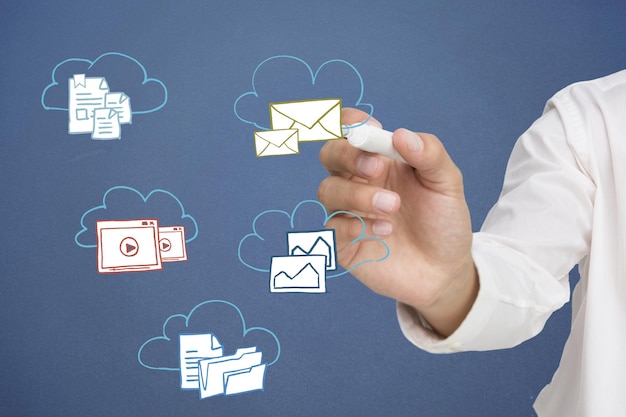 businessman writing graphic against blue background with vignette