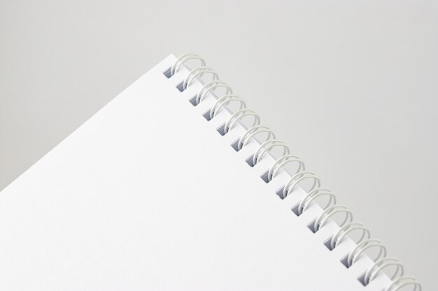 Photo a businessmans notebook with a zipper archiver and sheets in a ruler isolate