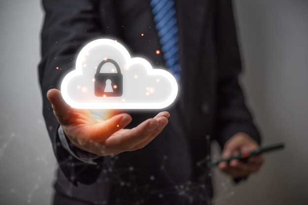 Businessmen Cloud security lock cyber is a key safe device protection of important devices upload backup data privacy databaseconcept of data theft prevention