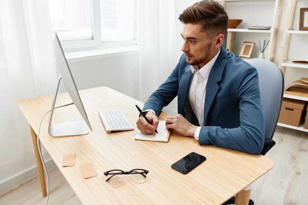 Businessmen at the desk in the office an official\
executive