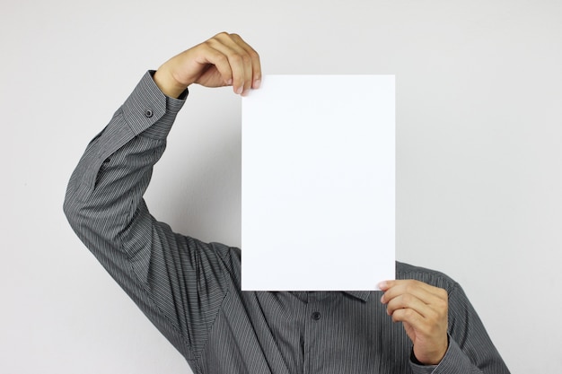 Businessmen hold blank white Paper and have copy space.