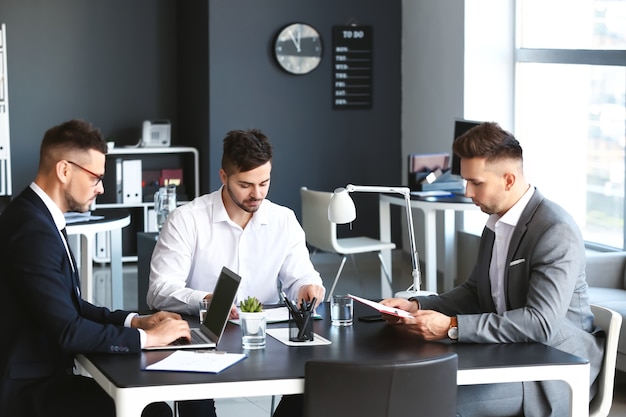 Businessmen during meeting in office