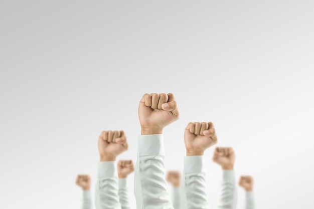 Businessmen raised their hands to win the celebration of the organization.