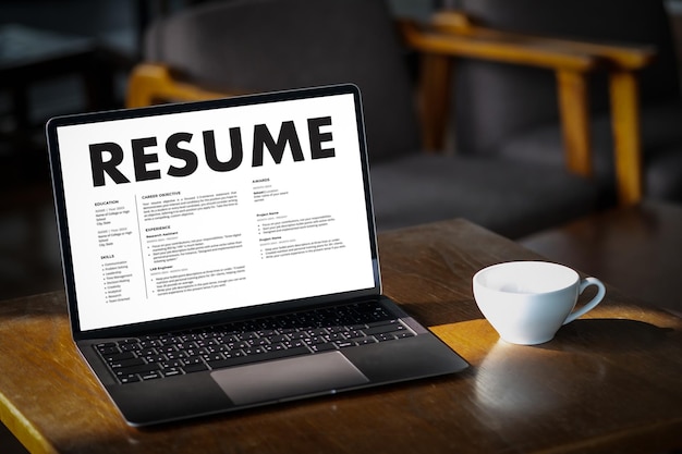businessmen reading resumes for a new job use laptops and cvs in the office applicant searching for new work human resource interview work resume document resource