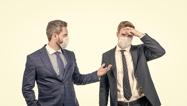 Photo businessmen in respirator mask have business communication during coronavirus pandemic negotiation