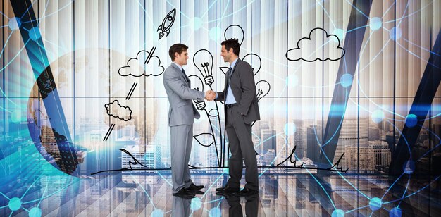 businessmen shaking hands against room with large window looking on city