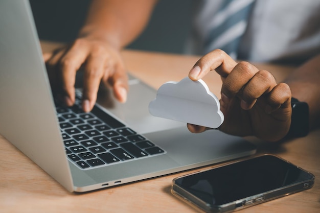 Photo businessmen use laptops to secure computing through cloud storage for digital business and cloud