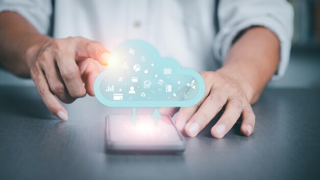 Businessmen use smartphones to network data communications through cloud databases