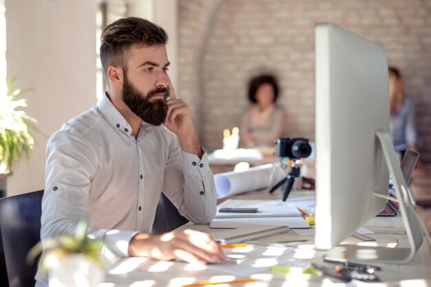 Businessmen using computer