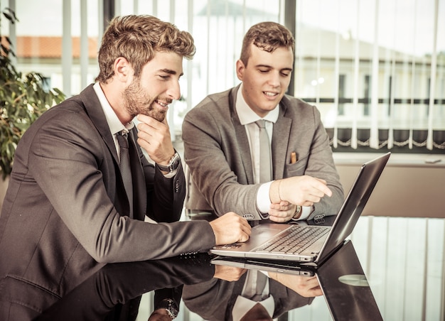 Businessmen with laptop