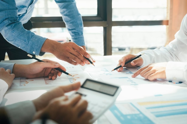 Businessmen working together at desk