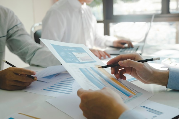 Businessmen working together at desk