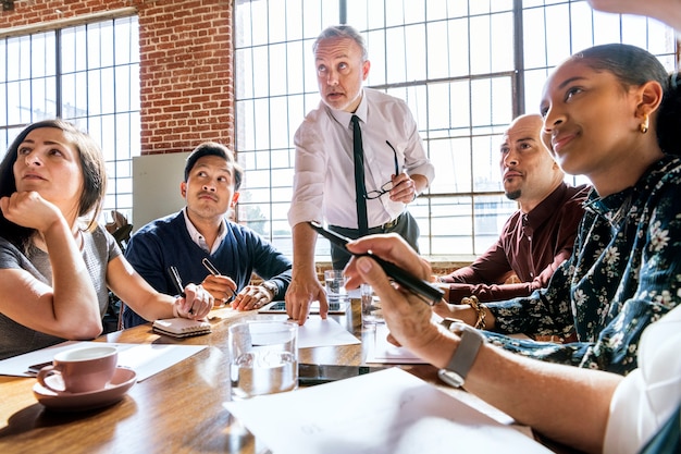 Businesspeople brainstorming in a meeting