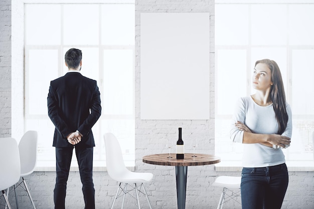 Businesspeople in cafe with poster