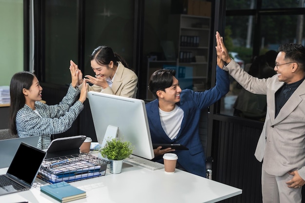 businesspeople coworker in office Happy to be successful partnership teamwork success concept