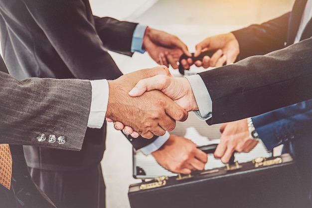 Businesspeople group handshake at city, business team