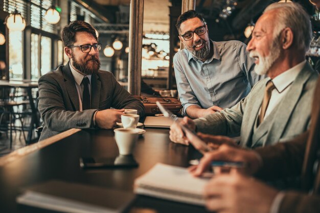 Businesspeople having meeting in the bar