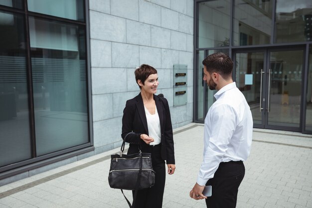 Businesspeople interacting with each other