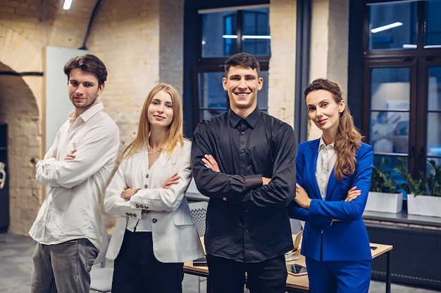 Businesspeople with crossed arms in the office