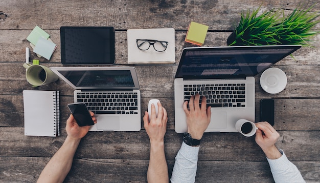 Businesspeople working on their computers