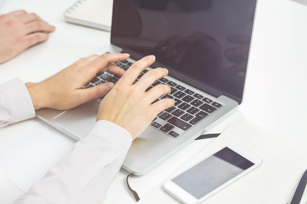 Businessperson using laptop