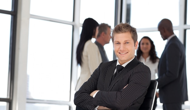 Businesss man in office sitting on chair