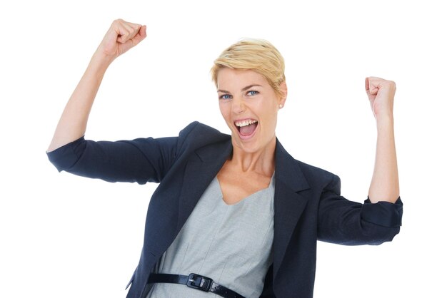 Businesswoman celebration and fist pump in studio portrait winner and victory by white background Female person professional and happy for corporate achievement promotion and success or bonus