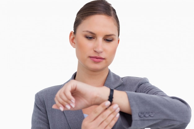 Businesswoman checking her watch