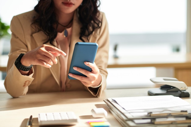 Businesswoman Checking Text Messages