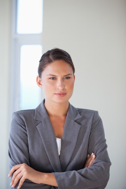 Businesswoman crossing arms