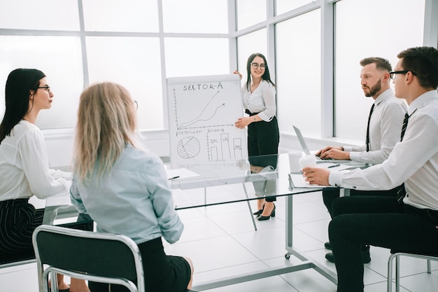 Businesswoman doing a presentation for the employees of the company