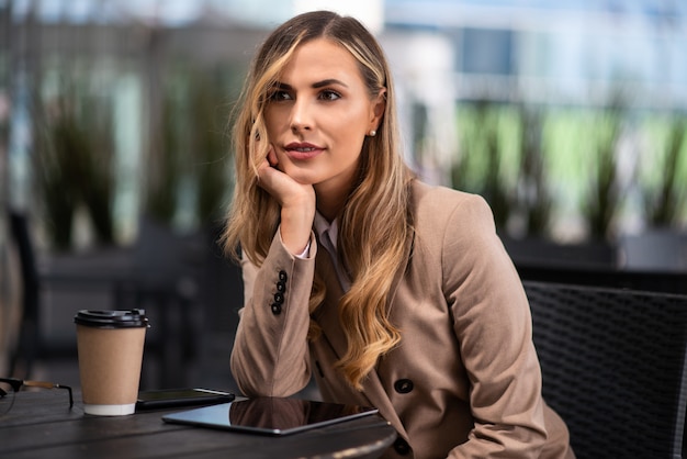 Businesswoman drinking a coffee