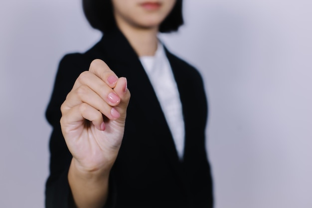 Businesswoman in front of visual touchscreen isolated on blur background Business concept Online