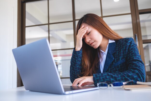 Businesswoman get stressed while having a problem at work in office