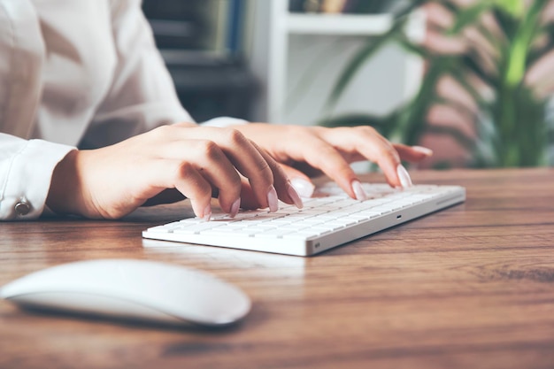 Businesswoman hand computer keyboard