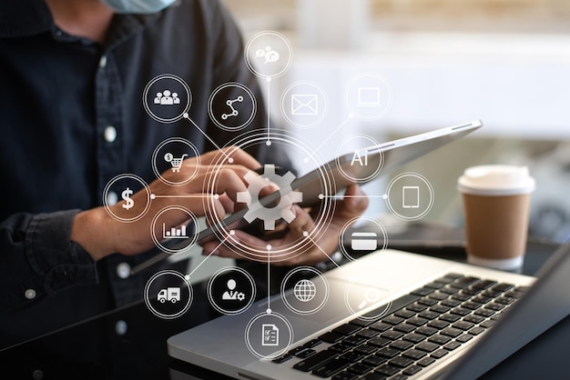 Photo businesswoman hand using laptop, tablet and smartphone  in office. digital marketing media mobile app in virtual icon screen