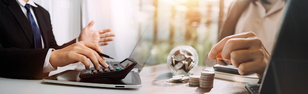 Businesswoman hand working with laptop computer tablet and smart phone in modern office with virtual icon diagram at modernoffice in morning light