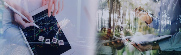 Businesswoman hand working with laptop computer tablet and smart phone in modern office with virtual icon diagram at modernoffice in morning light