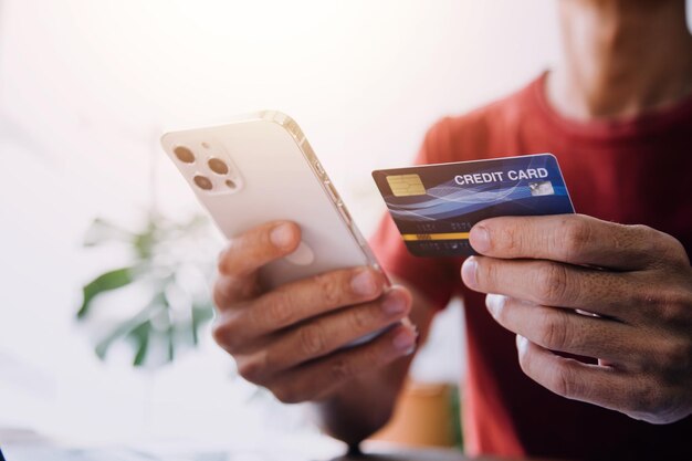 Businesswoman hands holding cradit card and using credit card online shopping Online shopping concept