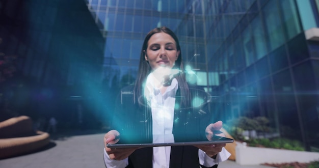 Businesswoman hands with digital tablet pc computer and 3d hologram of global communication network concept on device technology concept Global communication network concept Digital transformation