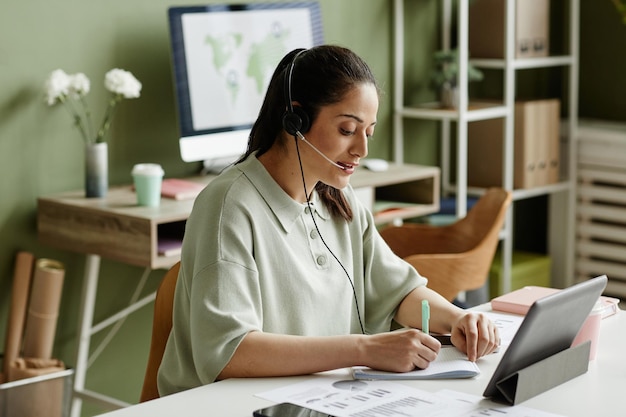 Businesswoman having online meeting at office